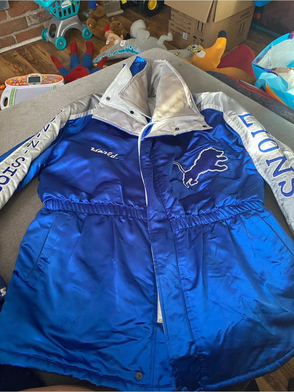 Blue and Silver Kids Puffer Jacket with Lions Chest Graphic